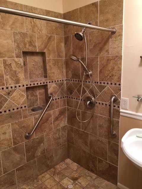 Example of a mid-sized transitional 3/4 alcove shower design with beige walls and a pedestal sink