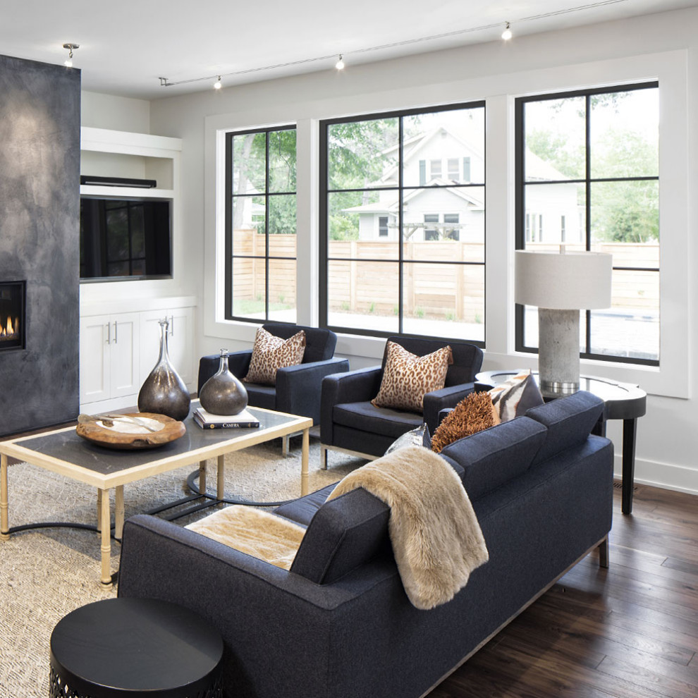 Photo of a contemporary living room in Columbus with grey walls, dark hardwood floors, a ribbon fireplace and a concrete fireplace surround.