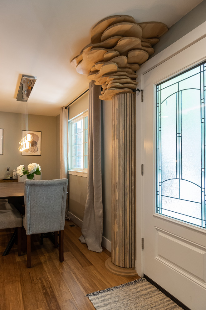 Mid-sized transitional dark wood floor and brown floor front door photo in Denver with gray walls and a white front door