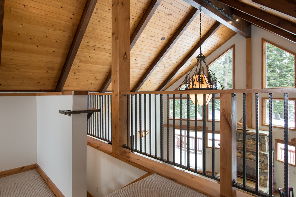 Inspiration for a rustic mixed material railing staircase remodel