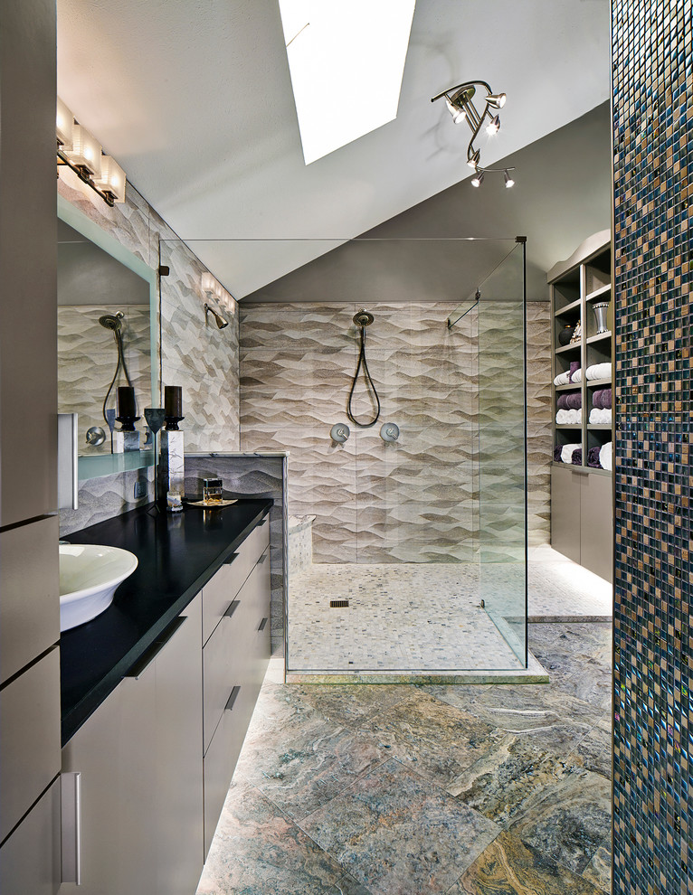 Inspiration for a large contemporary master bathroom in Dallas with flat-panel cabinets, grey cabinets, an alcove shower, beige tile, ceramic tile, beige walls, marble floors, an undermount sink, solid surface benchtops, multi-coloured floor and a hinged shower door.