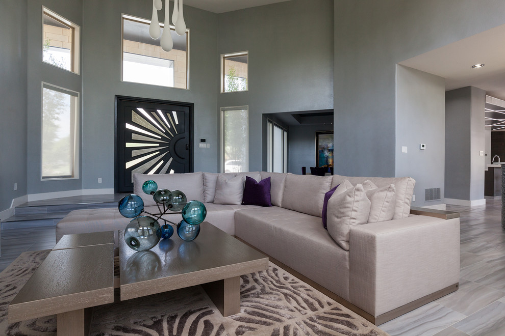 This is an example of a large contemporary formal open concept living room in Dallas with white walls, ceramic floors, a standard fireplace, a tile fireplace surround and no tv.