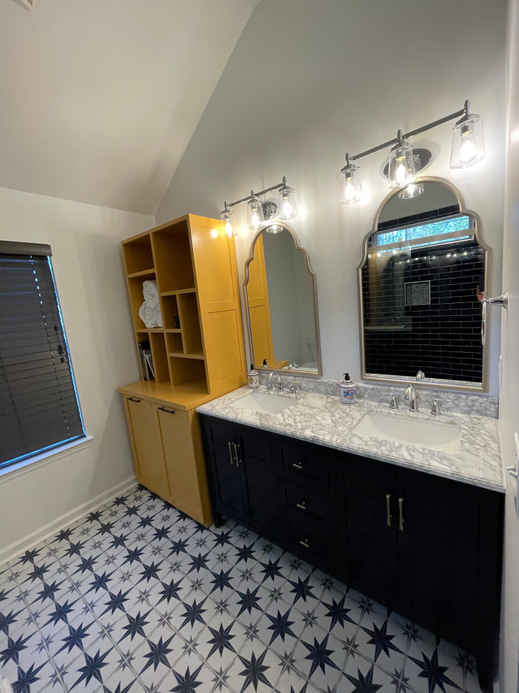 Minimalist blue tile and ceramic tile ceramic tile, multicolored floor, double-sink and vaulted ceiling bathroom photo in Atlanta with shaker cabinets, blue cabinets, a one-piece toilet, white walls, an undermount sink, marble countertops, yellow countertops, a niche and a freestanding vanity