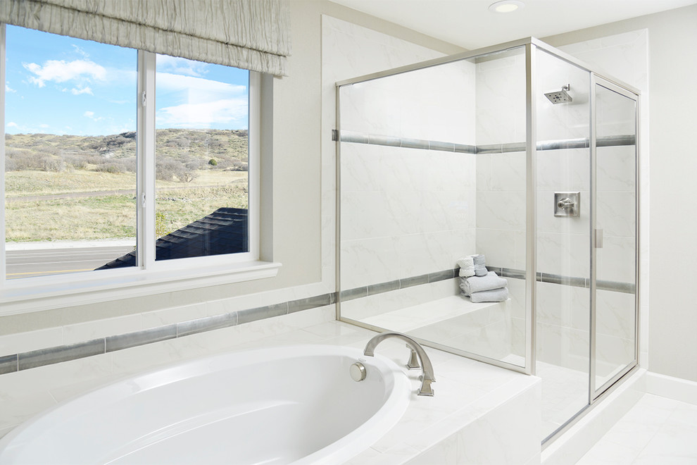 Design ideas for a transitional master bathroom in Denver with white cabinets and white benchtops.