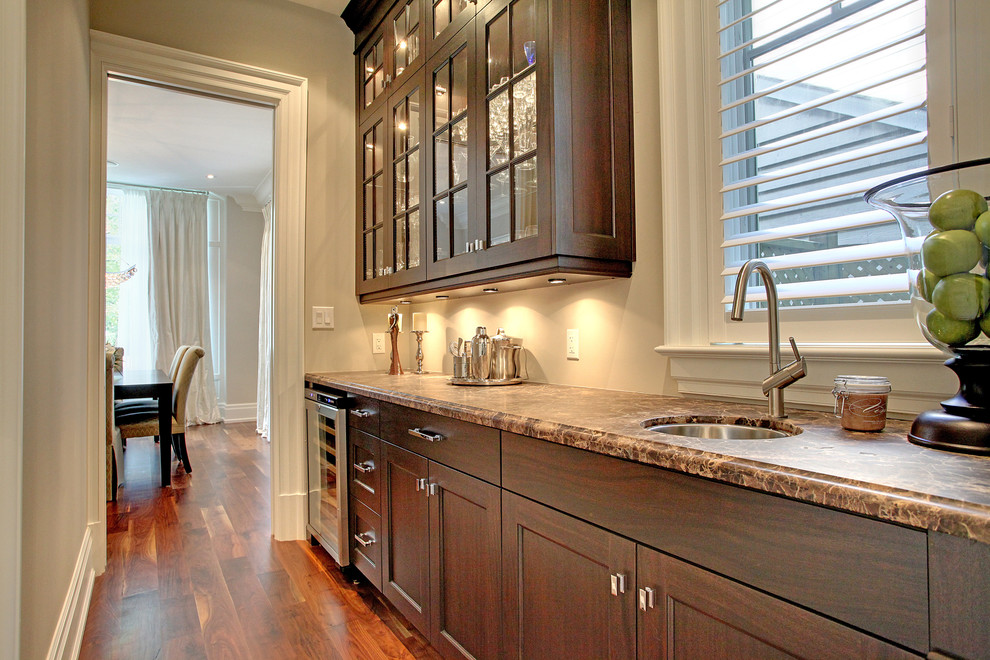 Example of a transitional kitchen design in Toronto