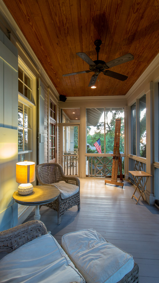 This is an example of a traditional front yard screened-in verandah in Other.