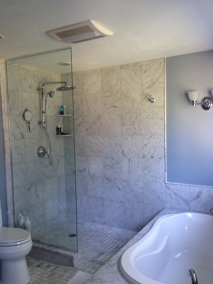 Mid-sized traditional master bathroom in Boston with a drop-in tub, an open shower, a one-piece toilet, black and white tile, porcelain tile, white walls and ceramic floors.