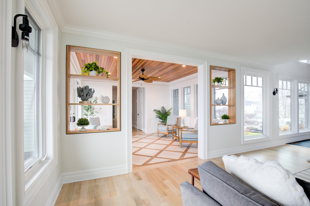Inspiration for a mid-sized beach style sunroom in Other with porcelain floors and beige floor.