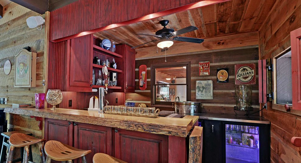 Inspiration for an eclectic home bar in Dallas.