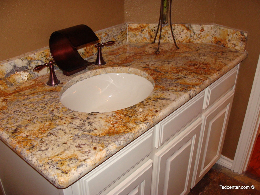 Mid-sized stone slab doorless shower photo