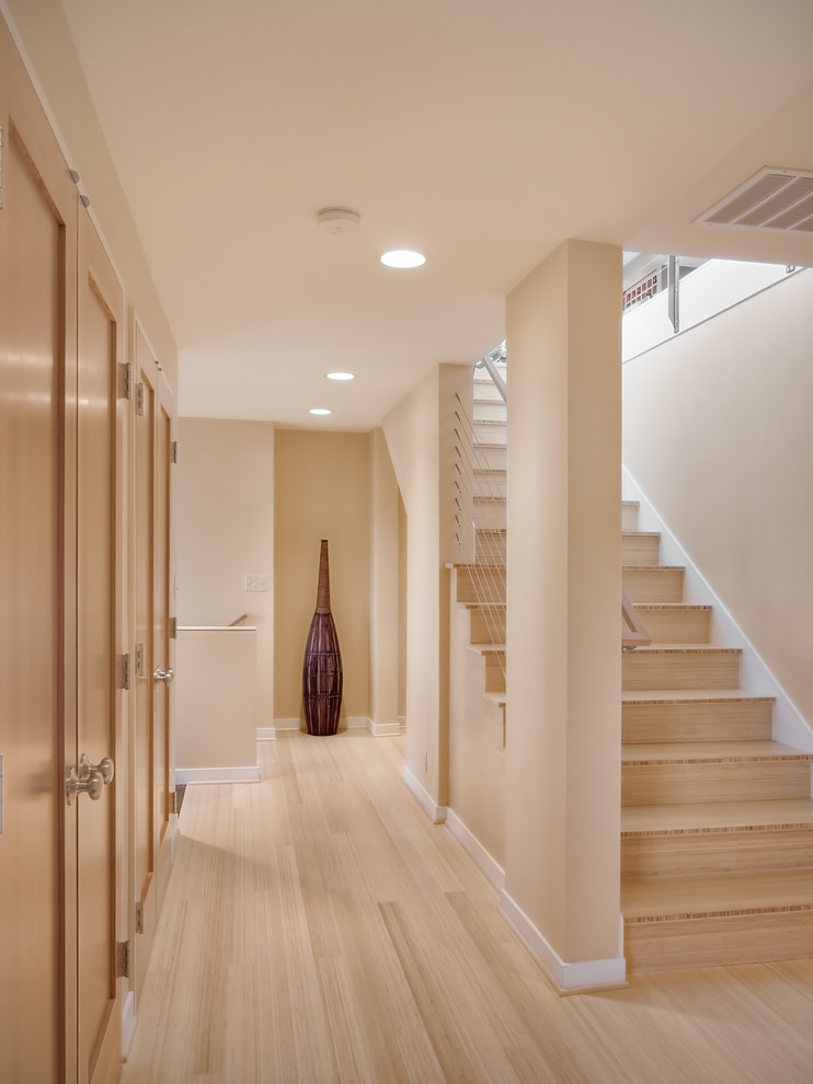 Inspiration for a contemporary wood straight staircase in Seattle.