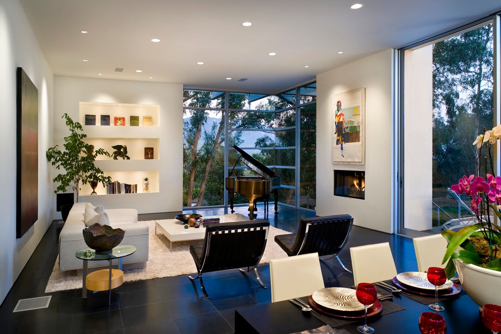 Photo of a large modern formal open concept living room in Santa Barbara with white walls, ceramic floors and black floor.