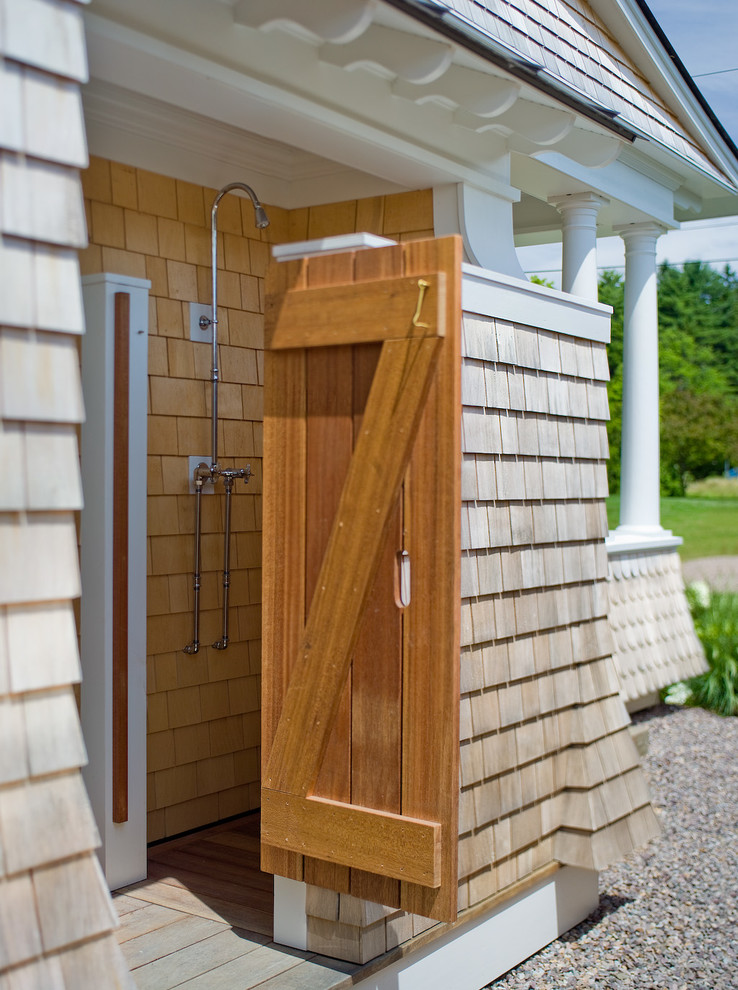 Photo of a beach style patio in Burlington with an outdoor shower.