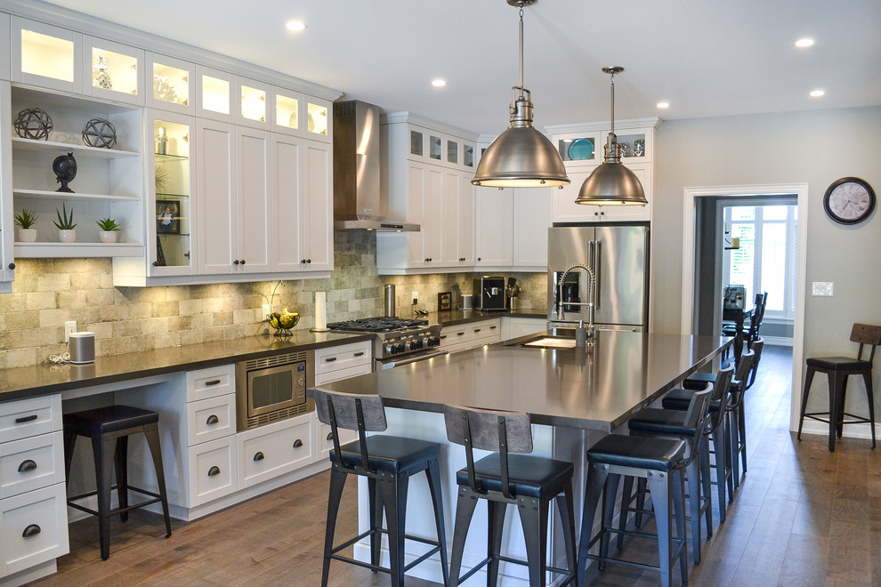 Example of a transitional kitchen design in Toronto
