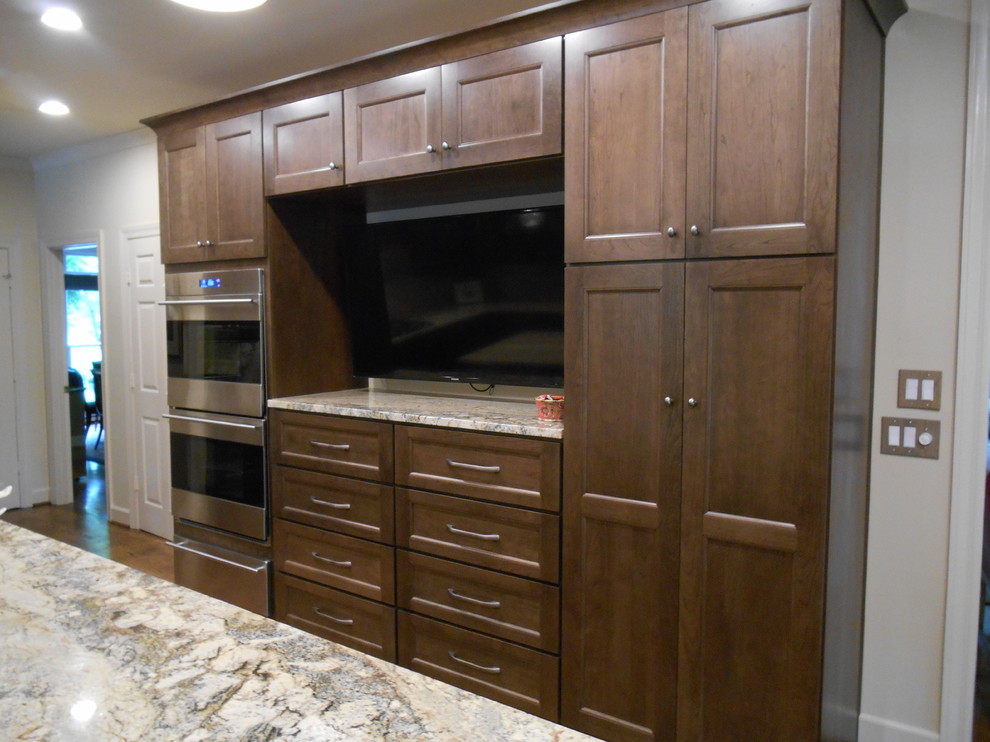 Example of a transitional home design design in Birmingham