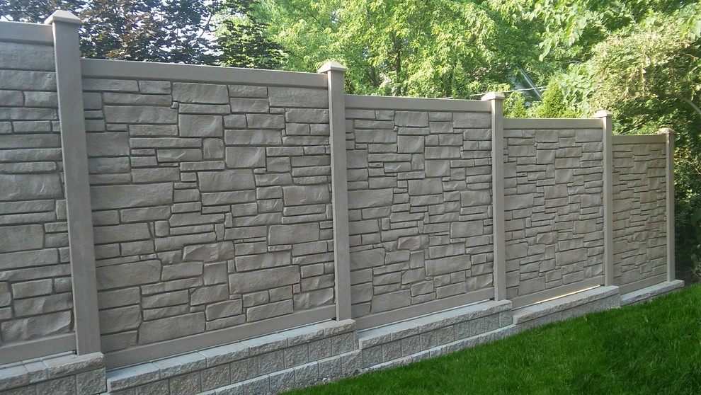 Inspiration for a large rustic drought-tolerant and full sun backyard stone retaining wall landscape in Chicago for summer.
