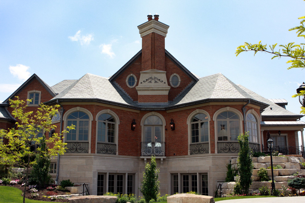 This is an example of a traditional three-storey brick exterior in Toronto.