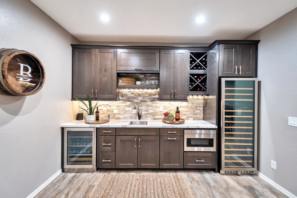 Example of a large transitional porcelain tile and multicolored floor basement design in Phoenix with gray walls
