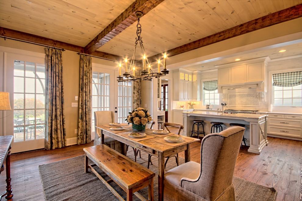 This is an example of a mid-sized country separate dining room in Atlanta with beige walls, dark hardwood floors and no fireplace.
