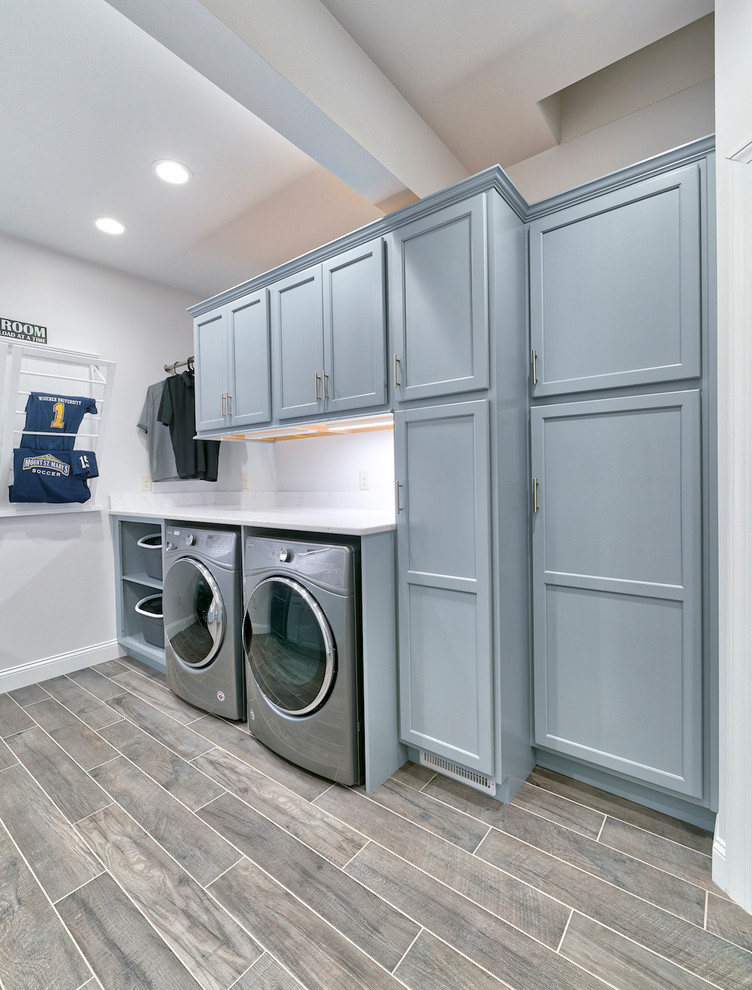 Example of a trendy laundry room design in Other