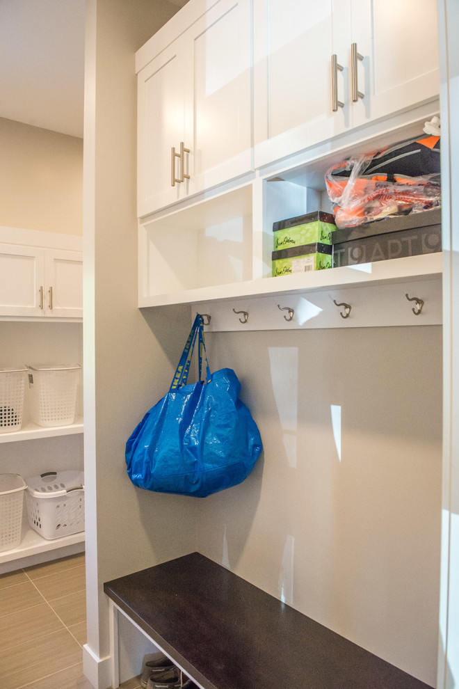 Mudroom - huge ceramic tile and multicolored floor mudroom idea