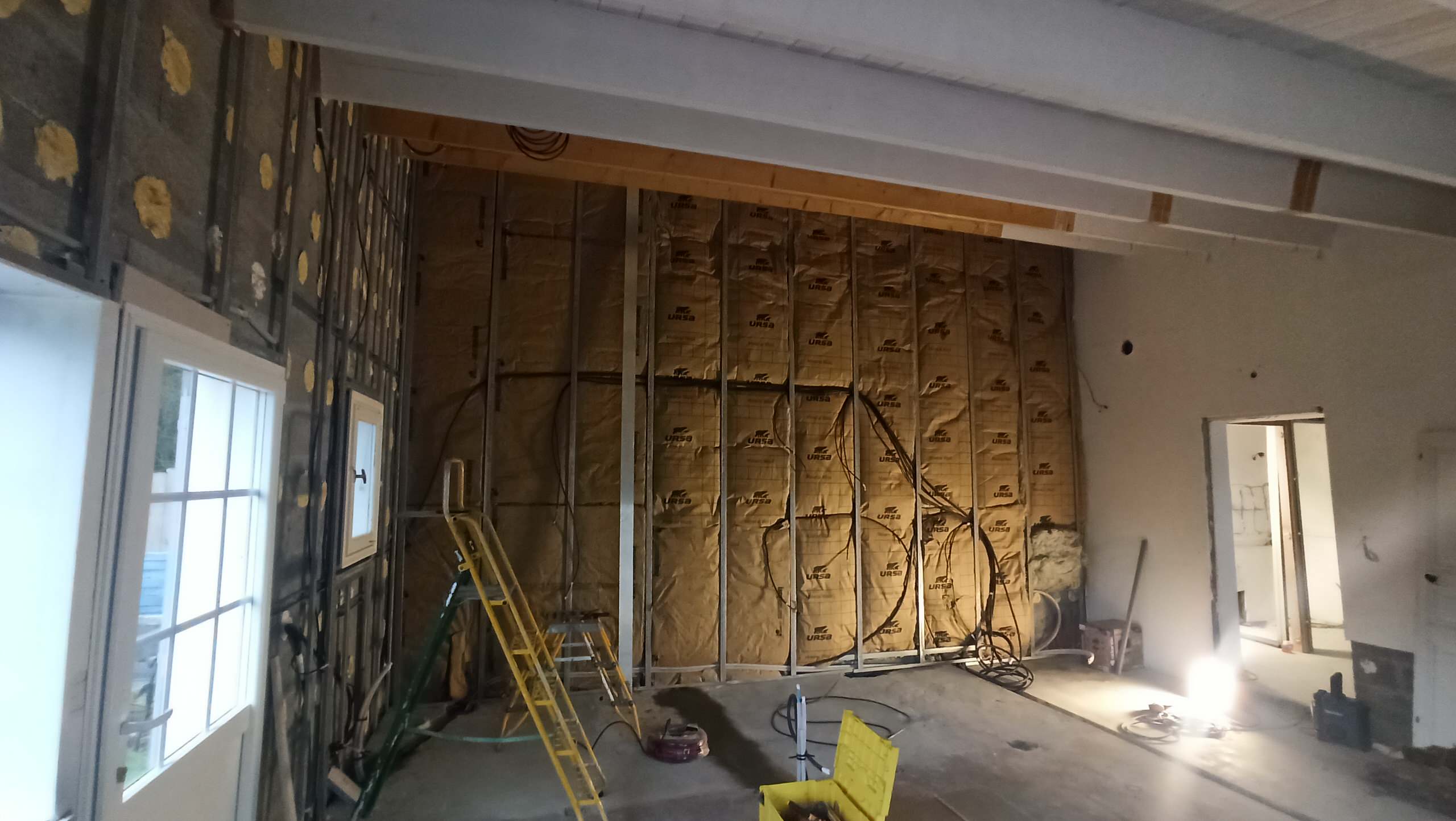 Transformation d'une chambre parentale en pièce de vie/cuisine