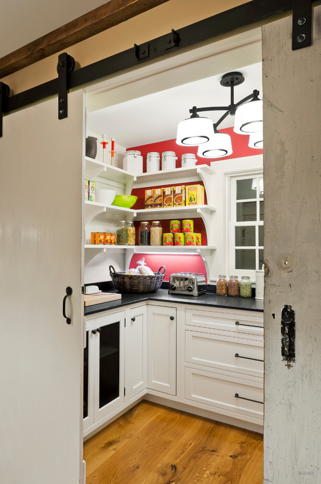 Mid-sized contemporary u-shaped kitchen pantry in Boston with open cabinets, white cabinets, quartz benchtops, red splashback and medium hardwood floors.