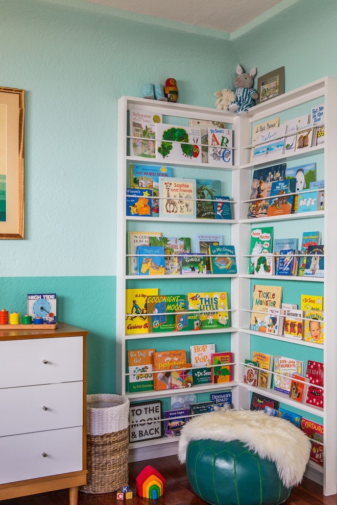 Inspiration for a mid-sized eclectic boy nursery remodel in Los Angeles with blue walls
