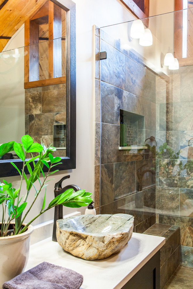 Inspiration for a mid-sized rustic master multicolored tile and porcelain tile porcelain tile and multicolored floor freestanding bathtub remodel with a vessel sink, shaker cabinets, quartz countertops, a one-piece toilet, gray walls and dark wood cabinets