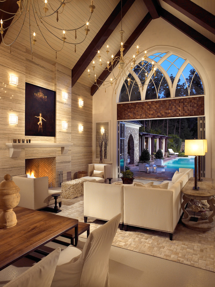 Design ideas for a transitional open concept living room in Nashville with a standard fireplace.
