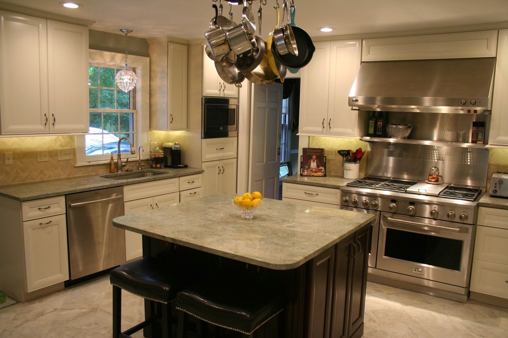 Mid-sized transitional u-shaped ceramic tile enclosed kitchen photo in Boston with a single-bowl sink, recessed-panel cabinets, white cabinets, granite countertops, green backsplash, stone tile backsplash, stainless steel appliances and an island