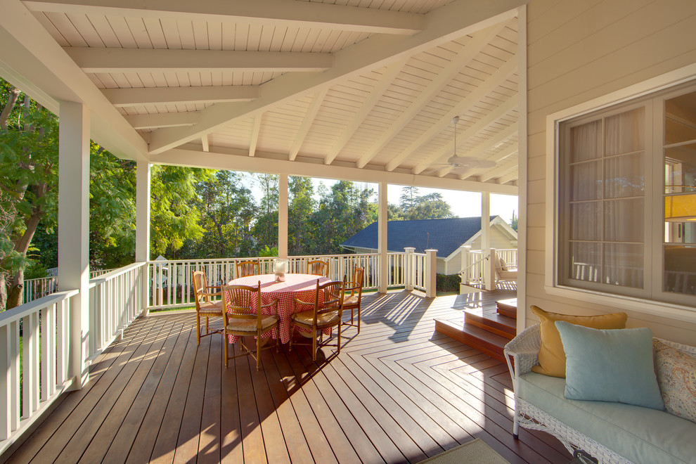 Design ideas for a large traditional verandah in Los Angeles with a roof extension.