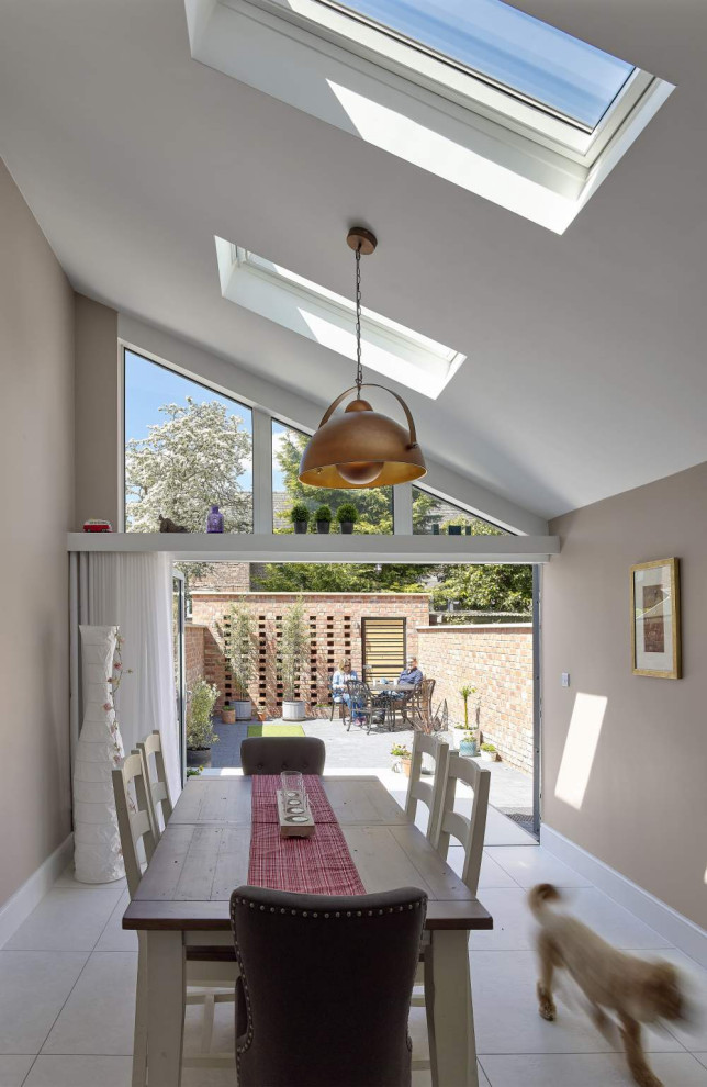 Photo of a mid-sized contemporary open plan dining in Cheshire.