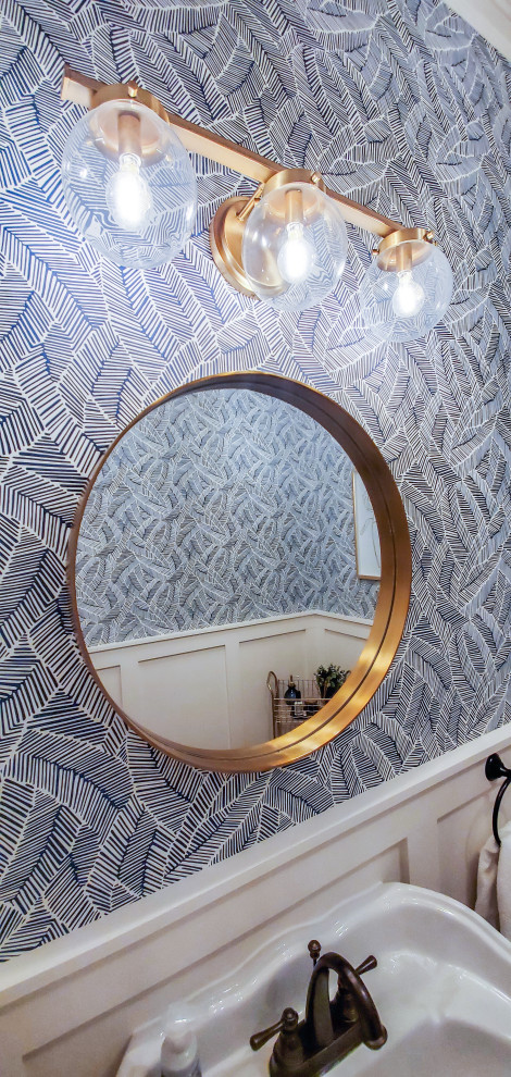 Photo of a midcentury powder room in Charlotte.
