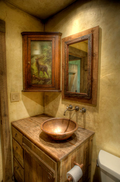 Inspiration for a country powder room in Austin.