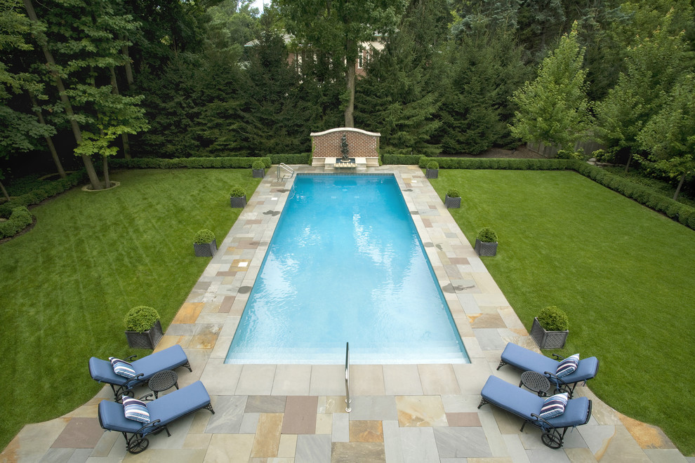 Photo of a traditional backyard rectangular pool in Chicago.
