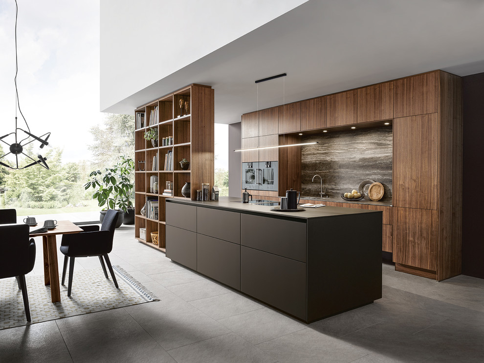 Contemporary galley open plan kitchen in Nuremberg with flat-panel cabinets, brown splashback, with island, brown benchtop and brown cabinets.