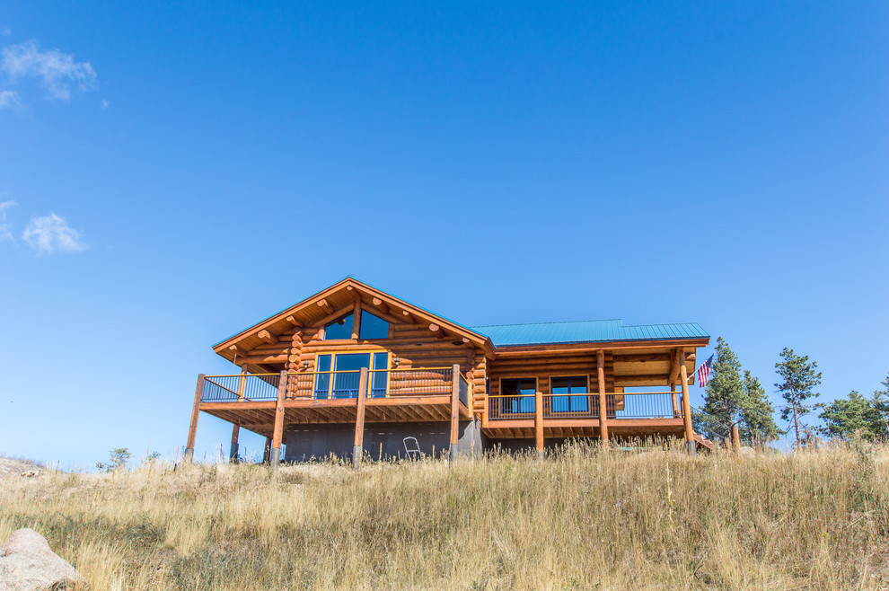 Mountain style home design photo in Denver