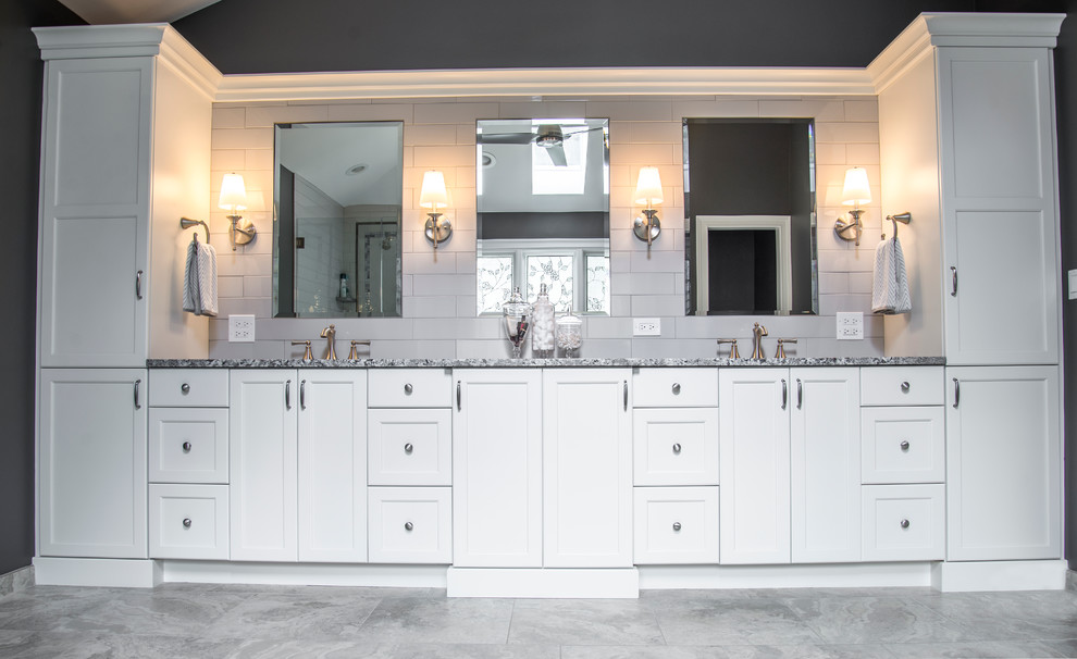 Mid-sized transitional master gray tile and subway tile porcelain tile freestanding bathtub photo in Chicago with flat-panel cabinets, white cabinets, a two-piece toilet, gray walls, an undermount sink and granite countertops