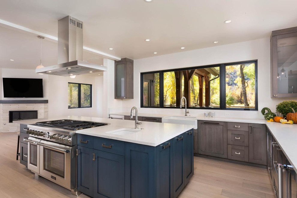 Inspiration for a transitional kitchen remodel in Denver with blue cabinets