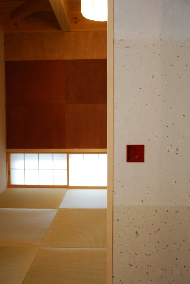 Immagine di un soggiorno american style con pavimento in tatami