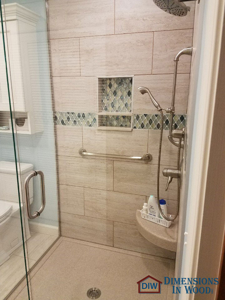 Small elegant master multicolored tile and ceramic tile cement tile floor and single-sink bathroom photo in Other with flat-panel cabinets, white cabinets, a two-piece toilet, blue walls, an undermount sink, quartzite countertops, a hinged shower door, beige countertops and a built-in vanity