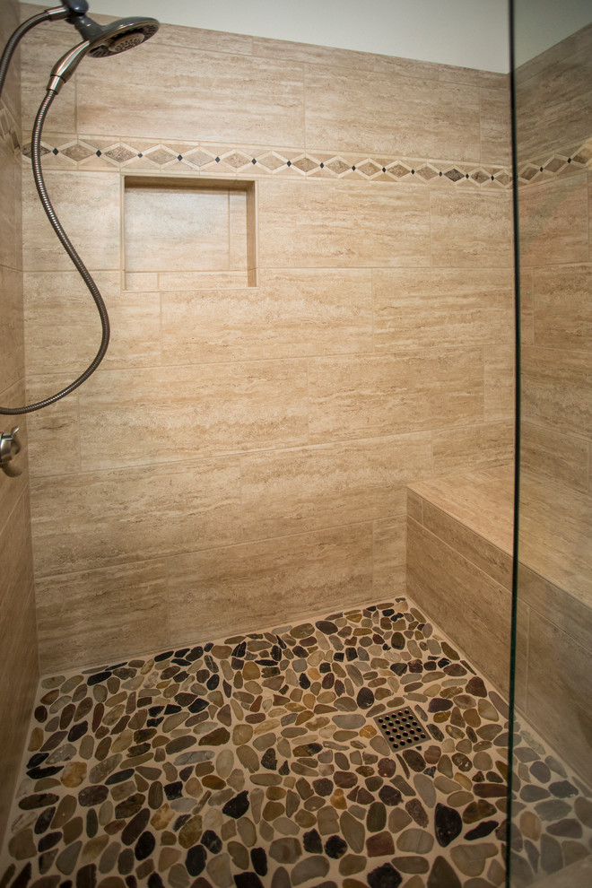 Mid-sized country master bathroom in Dallas with flat-panel cabinets, white cabinets, an alcove shower, a one-piece toilet, beige tile, porcelain tile, white walls, porcelain floors, an undermount sink, granite benchtops, beige floor, a hinged shower door and brown benchtops.