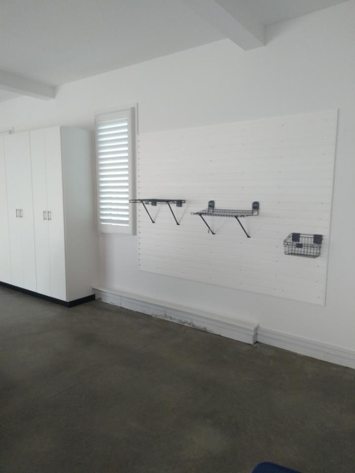 Garage with Cabinets & Slat Wall