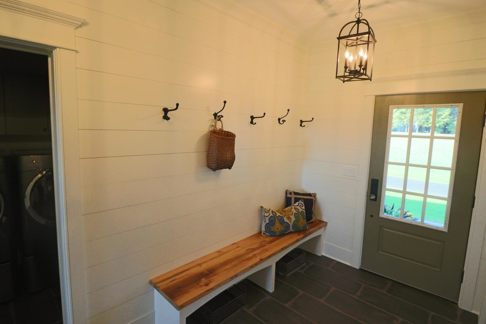 Design ideas for a large country mudroom in Boston with white walls, ceramic floors, a single front door and a green front door.