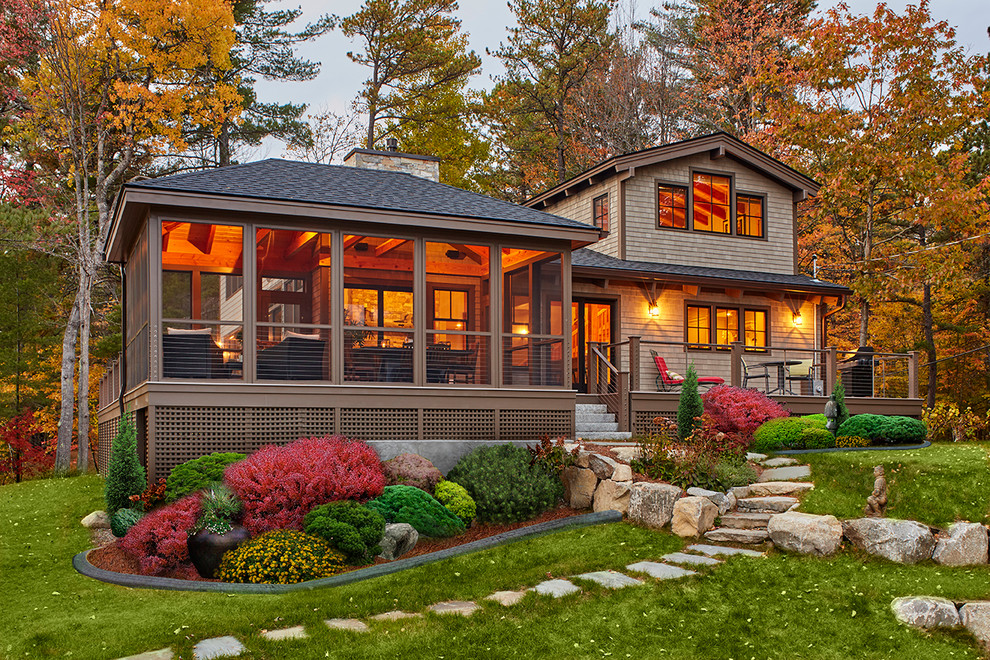 Inspiration for a country brown house exterior in Boston with a hip roof and a shingle roof.