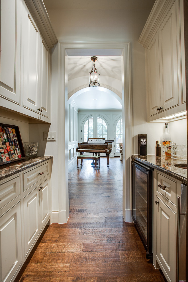 Design ideas for a traditional kitchen in Dallas with medium hardwood floors.