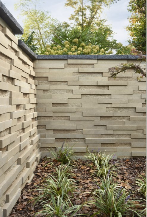 Design ideas for a contemporary backyard concrete paver formal garden in Philadelphia.