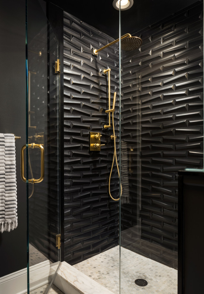 This is an example of a small modern kids bathroom in New York with an alcove shower, a two-piece toilet, black tile, ceramic tile, black walls, marble floors, a pedestal sink, white floor and a hinged shower door.
