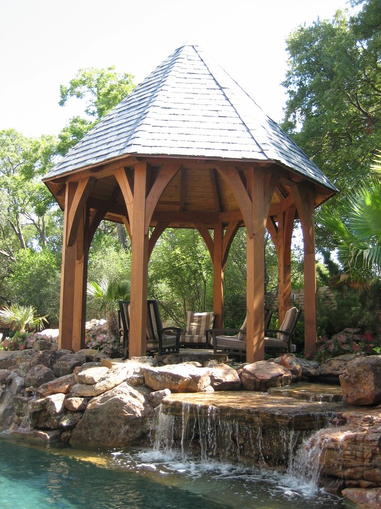 Eclectic patio in Dallas with a gazebo/cabana.
